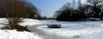 Boat on a frozen Hollow Pond